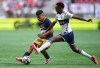 Pumas UNAM's Piero Quispe, back left, and Vancouver Whitecaps' Ali Ahmed vie for the ball during the first half of a Leagues Cup soccer match, in Vancouver on August 7, 2024. THE CANADIAN PRESS/Darryl Dyck