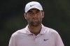Scottie Scheffler walks up to the seventh green during the second round of the Tour Championship golf tournament, Friday, Aug. 30, 2024, in Atlanta. (AP Photo/Mike Stewart)