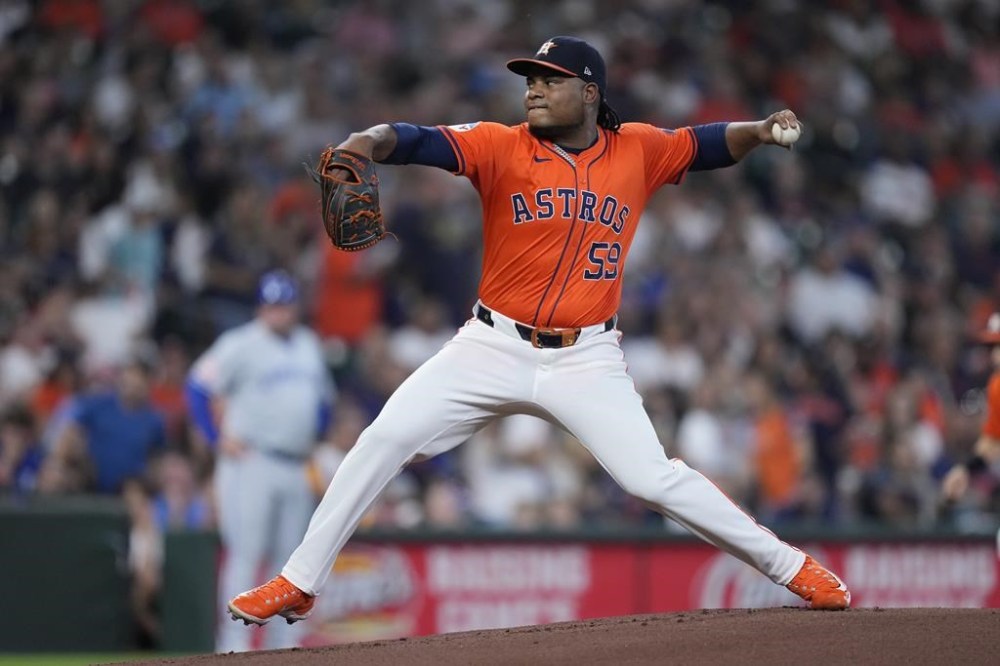 Houston Astros starting pitcher Framber Valdez delivers during the first inning of a baseball game against the Kansas City Royals, Friday, Aug. 30, 2024, in Houston. (AP Photo/Kevin M. Cox)