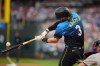Philadelphia Phillies' Bryce Harper hits a double against Atlanta Braves pitcher Reynaldo López during the first inning of a baseball game, Friday, Aug. 30, 2024, in Philadelphia. (AP Photo/Matt Slocum)