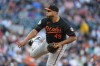 Baltimore Orioles starting pitcher Albert Suárez works against the Colorado Rockies in the first inning of a baseball game Friday, Aug. 30, 2024, in Denver. (AP Photo/David Zalubowski)