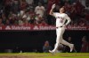 Los Angeles Angels' Mickey Moniak gets as he scores after hitting a solo home run during the firth inning of a baseball game against the Seattle Mariners Friday, Aug. 30, 2024, in Anaheim, Calif. (AP Photo/Mark J. Terrill)