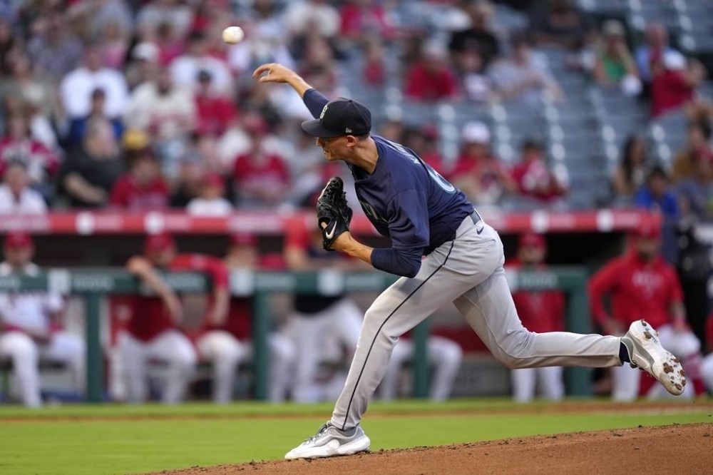 Seattle Mariners starting pitcher George Kirby throws to the plate during the first inning of a baseball game against the Los Angeles Angels, Friday, Aug. 30, 2024, in Anaheim, Calif. (AP Photo/Mark J. Terrill)