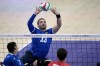 Dmytro Melnyk of Ukraine returns the ball during the men's preliminary round Sitting Volleyball game against Iran at the 2024 Paralympics, Friday, Aug. 30, 2024, in Paris, France. (AP Photo/Christophe Ena)
