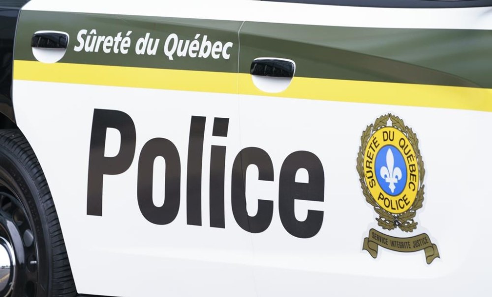 Police have arrested a suspect in connection with the murder of a man who was killed in the Laurentians region of Quebec earlier this week. A Surete du Quebec police car is seen in Montreal, Wednesday, July 22, 2020. THE CANADIAN PRESS/Paul Chiasson