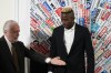 FILE - SS Napoli striker Victor Osimhen, right, arrives with team President Aurelio De Laurentiis, at the Foreign Press club to receive the 