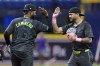 Tampa Bay Rays' Jose Siri celebrates with Junior Caminero (13) after the team defeated the San Diego Padres during a baseball game Saturday, Aug. 31, 2024, in St. Petersburg, Fla. (AP Photo/Chris O'Meara)
