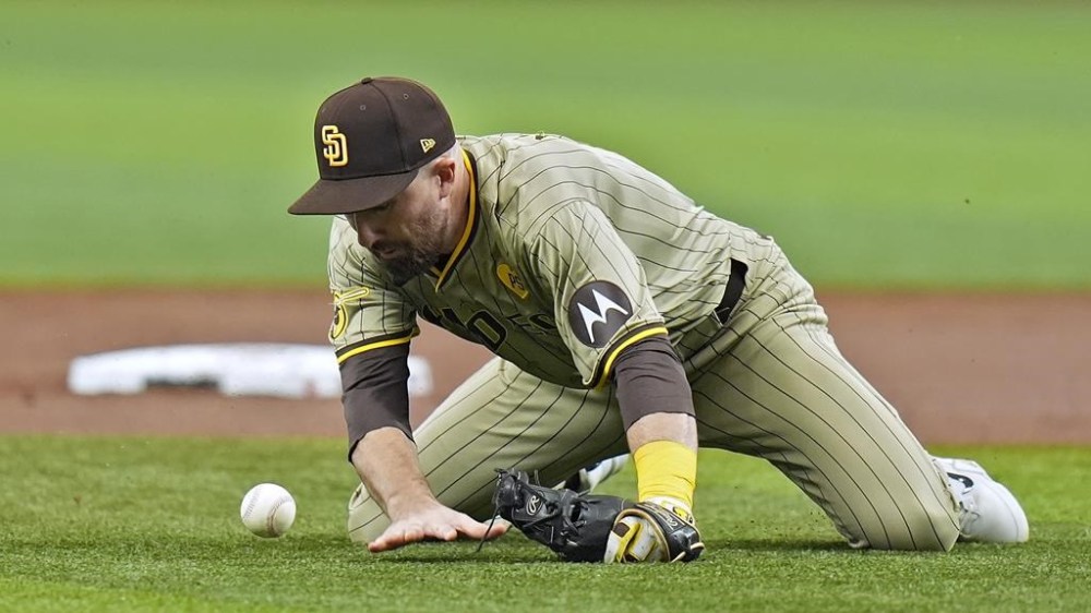 San Diego Padres shortstop Mason McCoy can't cleanly field an RBI single by Tampa Bay Rays' Jose Caballero during the first inning of a baseball game Saturday, Aug. 31, 2024, in St. Petersburg, Fla. (AP Photo/Chris O'Meara)