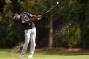 Sahith Theegala hits his second shot from the fairway on the seventh hole during the third round of the Tour Championship golf tournament, Saturday, Aug. 31, 2024, in Atlanta. (AP Photo/Jason Allen)