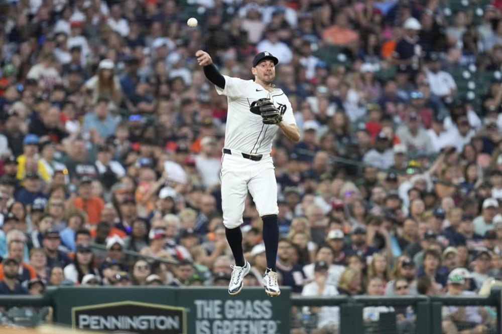 Detroit Tigers third baseman Ryan Kreidler throws to first base for an out on a Boston Red Sox Treston Casas ground ball in the eighth inning of a baseball game, Saturday, Aug. 31, 2024, in Detroit. (AP Photo/Paul Sancya)
