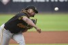 Pittsburgh Pirates starting pitcher Luis Ortiz delivers against the Cleveland Guardians during the first inning of a baseball game in Cleveland, Saturday, Aug. 31, 2024. (AP Photo/Phil Long)