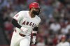 Los Angeles Angels' Jo Adell runs the bases after hitting a home run during the third inning of a baseball game against the Seattle Mariners in Anaheim, Calif., Saturday, Aug. 31, 2024. (AP Photo/Ashley Landis)