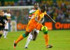 FILE - Ivory Coast's Souleymane Bamba, front, is challenged by Mali's Tidiane Cheick Diabate during their African Cup of Nations semi final soccer match at Stade de L'Amitie in Libreville, Gabon, Wednesday, Feb. 8, 2012. (AP Photo/Francois Mori, File)