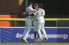 Detroit Tigers' Parker Meadows, from left, Kerry Carpenter and Matt Vierling (8) celebrate after the final out against the Boston Red Sox in a baseball game, Sunday, Sept. 1, 2024, in Detroit. (AP Photo/Paul Sancya)