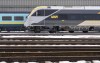 Passenger trains sit on the tracks at the Via Rail Canada Maintenance Centre in Montreal, Feb. 22, 2024. Via Rail apologizes after passengers stranded Canada's transport minister says he is determined to get to the bottom of a recent train delay that left passengers stranded for about 10 hours.THE CANADIAN PRESS/Christinne Muschi