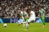 Real Madrid's Kylian Mbappe shoots a penalty kick to score his sides second goal during the Spanish La Liga soccer match between Real Madrid and Betis at the Santiago Bernabeu stadium in Madrid, Spain, Sunday, Sept. 1, 2024. (AP Photo/Pablo Garcia)