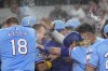 Texas Rangers' Josh Jung, second from left, celebrates with Carson Kelly (18) and other teammates after hitting a three-run home run in the 10th inning of a baseball game against the Oakland Athletics, Sunday, Sept. 1, 2024, in Arlington, Texas. (AP Photo/LM Otero)