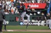 Miami Marlins shortstop Otto Lopez, cemter left, and left fielder Kyle Stowers, center right, celebrate after their victory over the San Francisco Giants in a baseball game Sunday, Sept. 1, 2024, in San Francisco. (AP Photo/Godofredo A. Vásquez)