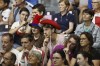A group of fans shush the crowd as the 