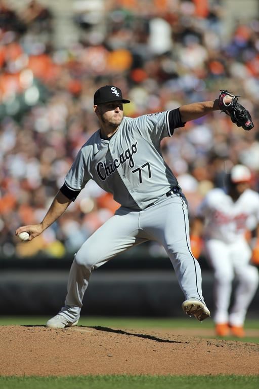 Chicago White Sox pitcher Chris Flexen delivers during the first inning of a baseball game against the Baltimore Orioles, Monday, Sept. 2, 2024, in Baltimore. (AP Photo/Daniel Kucin Jr.)