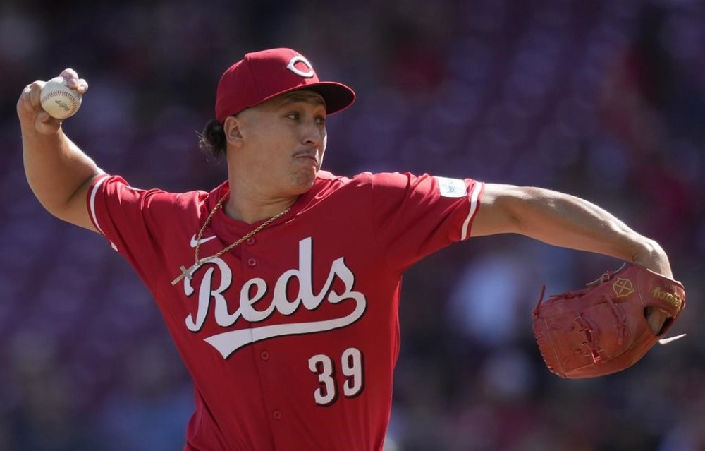 Cincinnati Reds starting pitcher Julian Aguiar throws during the first inning of a baseball game against the Houston Astros, Monday, Sept. 2, 2024, in Cincinnati. (AP Photo/Carolyn Kaster)