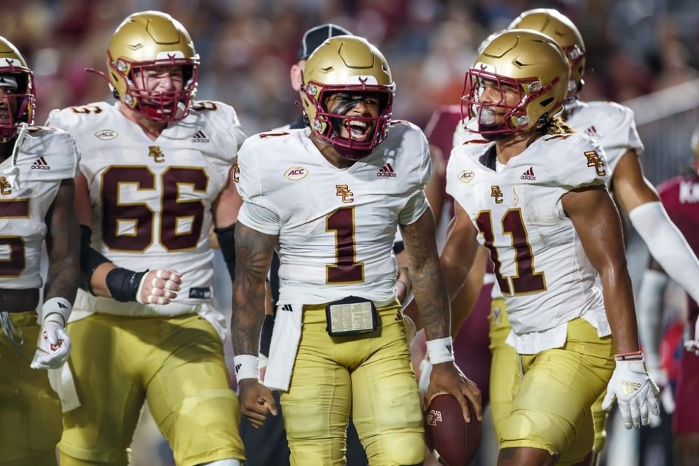 Boston College quarterback Thomas Castellanos (1) celebrates after scoring the first touchdown against Florida State during the first half of an NCAA college football game, Monday, Sept. 2, 2024, in Tallahassee, Fla. (AP Photo/Colin Hackley)