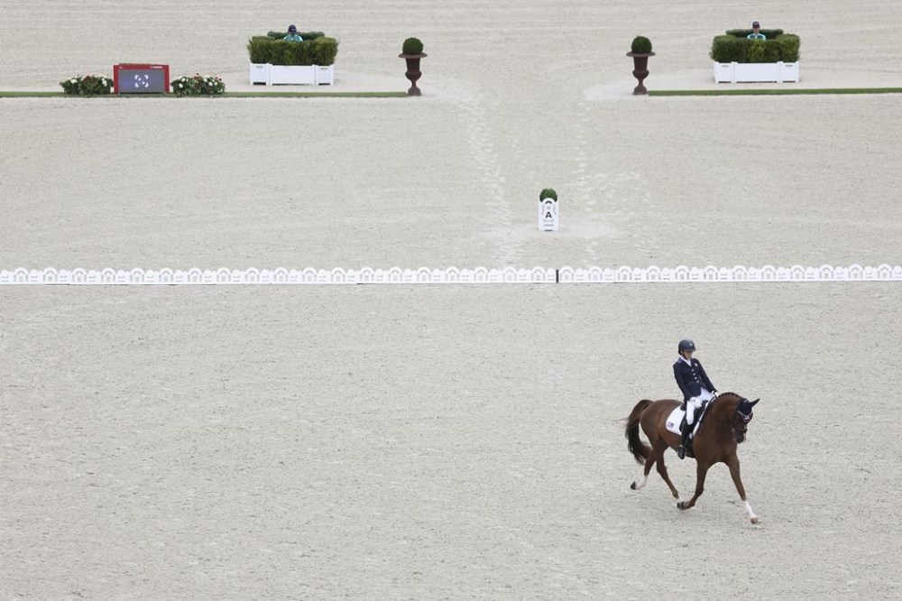 Fiona Howard of the U.S. competes in the equestrian grade II individual event at the Palace of Versailles, taking home the gold medal in her first Paralympic Games at the 2024 Paralympics, Tuesday, Sept. 3, 2024. (AP Photo/Kileigh Kane)