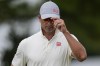 Adam Scott, of Australia, walks off the fifth green during the second round of the Tour Championship golf tournament, Friday, Aug. 30, 2024, in Atlanta. (AP Photo/Mike Stewart)