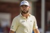 Sam Burns walks off of the green at the fourth hole after making his putt during the third round of the Tour Championship golf tournament, Saturday, Aug. 31, 2024, in Atlanta. (AP Photo/Jason Allen)