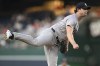 New York Yankees pitcher Gerrit Cole follows through during the first inning of a baseball game against the Washington Nationals, Tuesday, Aug. 27, 2024, in Washington. (AP Photo/John McDonnell)