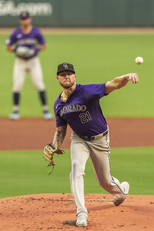 Colorado Rockies pitcher Kyle Freeland (21) throws in the first inning of a baseball game against the Atlanta Braves, Tuesday, Sep. 3, 2024, in Atlanta. (AP Photo/Jason Allen)