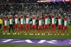 FILE -Palestinian team stand for the national anthem ahead of the Asian Cup Group C soccer match between Iran and Palestine at the Education City Stadium in Al Rayyan, Qatar, Jan. 14, 2024. (AP Photo/Aijaz Rahi, File)