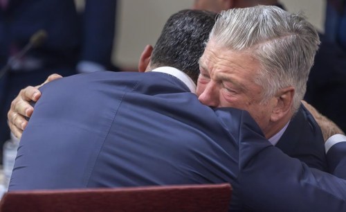 FILE - Actor Alec Baldwin, right, hugs his defense attorney Alex Spiro after District Court Judge Mary Marlowe Sommer threw out the involuntary manslaughter case, July 12, 2024, in Santa Fe, N.M., for the 2021 fatal shooting of cinematographer Halyna Hutchins during filming of the Western movie 