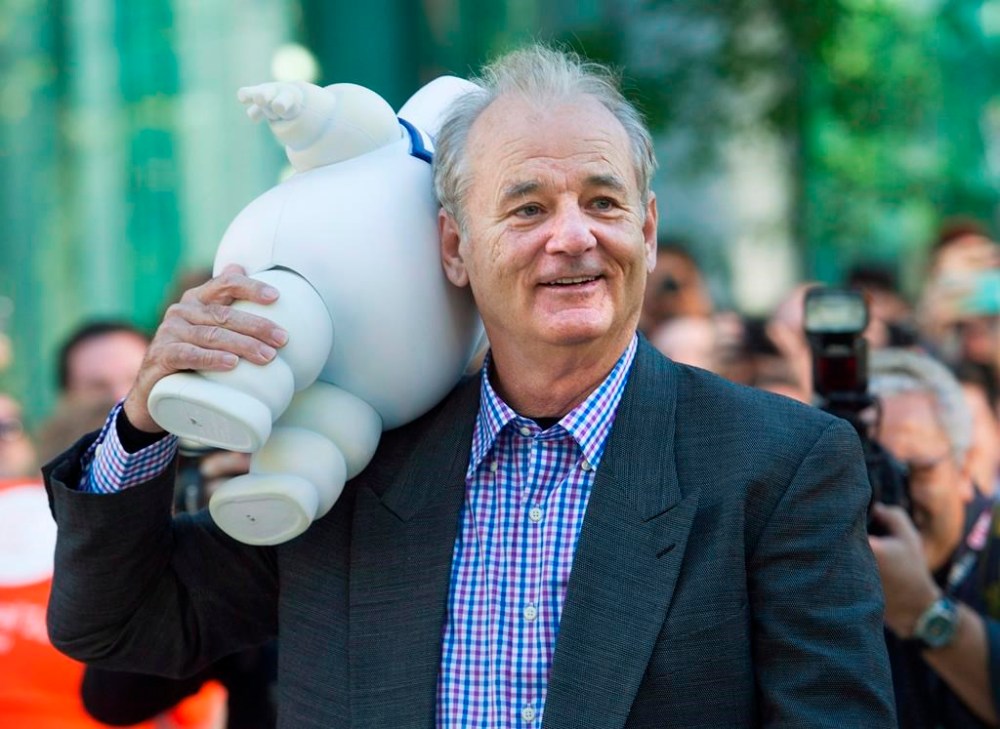 Actor Bill Murray walks with the Marshmallow Man from his 1980s box office hit movie Ghostbusters poses for photographs on the red carpet at the gala during the 37th annual Toronto International Film Festival in Toronto on Monday, Sept. 10, 2012. The Toronto International Film Festival returns in full force today after navigating several years of pandemic-related challenges and industry disruptions. THE CANADIAN PRESS/Nathan Denette