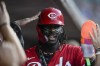 Cincinnati Reds' Elly De La Cruz celebrates in the dugout after scoring off a single hit by Tyler Stephenson during the third inning of a baseball game against the Houston Astros, Wednesday, Sept. 4, 2024, in Cincinnati. (AP Photo/Carolyn Kaster)
