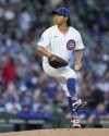 Chicago Cubs pitcher Shota Imanaga winds up during the first inning of a baseball game against the Pittsburgh Pirates, Wednesday, Sept. 4, 2024, in Chicago. (AP Photo/Charles Rex Arbogast)