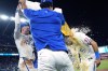 Kansas City Royals' Tommy Pham, left, is doused by Bobby Witt Jr. (7) and MJ Melendez after their baseball game against the Cleveland Guardians Wednesday, Sept. 4, 2024, in Kansas City, Mo. The Royals won 4-1. (AP Photo/Charlie Riedel)