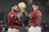 Arizona Diamondbacks' Eugenio Suárez, left, celebrates with Christian Walker after the Diamondbacks defeated the San Francisco Giants in a baseball game in San Francisco, Wednesday, Sept. 4, 2024. (AP Photo/Jeff Chiu)