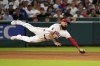Los Angeles Angels third baseman Anthony Rendon can't get to a ball hit for an RBI single by Los Angeles Dodgers' Andy Pages during the seventh inning of a baseball game, Wednesday, Sept. 4, 2024, in Anaheim, Calif. (AP Photo/Mark J. Terrill)