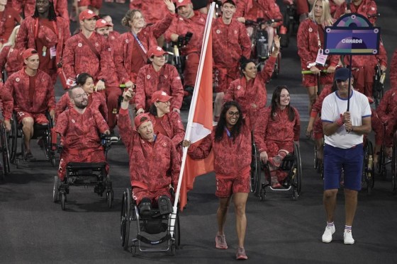 Canadian athletes parade during the Opening Ceremony for the 2024 Paralympics in Paris, France. (Emilio Morenatti / The Associated Press files)