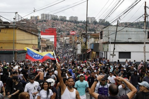 FILE - Protesters demonstrate against the official election results declaring President Nicolas Maduro won reelection in the Catia neighborhood of Caracas, Venezuela, July 29, 2024, the day after the vote. (AP Photo/Cristian Hernandez, File)