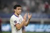 FILE - United States' Gio Reyna (7) walks to the stage during the trophy presentation after a CONCACAF Nations League final soccer match against Mexico, Sunday, March 24, 2024, in Arlington, Texas. (AP Photo/Tony Gutierrez, File)