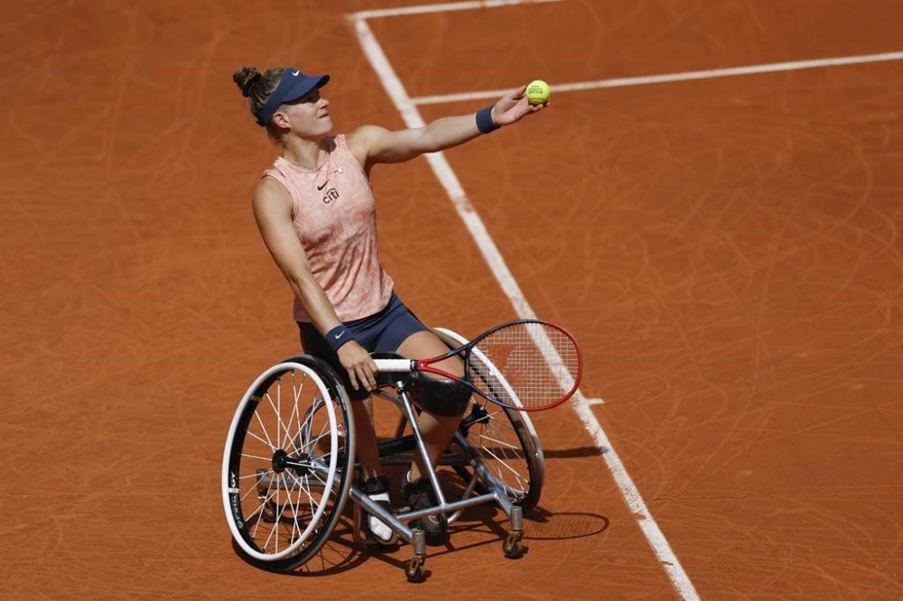 FILE - Netherlands' Diede de Groot serves against China's Zhu Zhenzhen in the women's wheelchair final match of the French Open tennis tournament at the Roland Garros stadium in Paris, France, Saturday, June 8, 2024. (AP Photo/Aurelien Morissard, File)