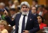Minister of Transport Pablo Rodriguez rises during Question Period in the House of Commons on Parliament Hill in Ottawa on June 12, 2024. Transport Minister Pablo Rodriguez says Via Rail has 30 days to make some changes following a train delay that left passengers stranded over the weekend. THE CANADIAN PRESS/ Patrick Doyle