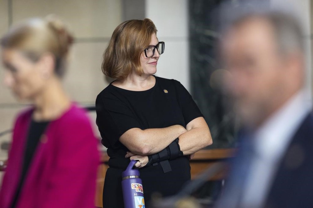 State Sen. Machaela Cavanaugh works on the legislative floor of the Nebraska State Capitol during the 108th Legislature 1st Special Session, Aug. 8, 2024, in Lincoln, Neb. (AP Photo/Rebecca S. Gratz)