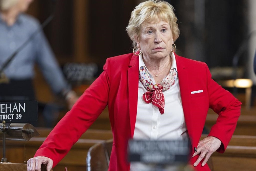 FILE - State Sen. Lou Ann Linehan works on the legislative floor of the Nebraska State Capitol during the 108th Legislature 1st Special Session, Aug. 8, 2024, in Lincoln, Neb. (AP Photo/Rebecca S. Gratz, File)
