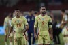 Spain's Dani Carvajal, right, and Pedri walk on the pitch after the UEFA Nations League soccer match between Serbia and Spain at the Rajko Mitic Stadium, in Belgrade, Serbia, Thursday, Sept. 5, 2024. (AP Photo/Darko Vojinovic)