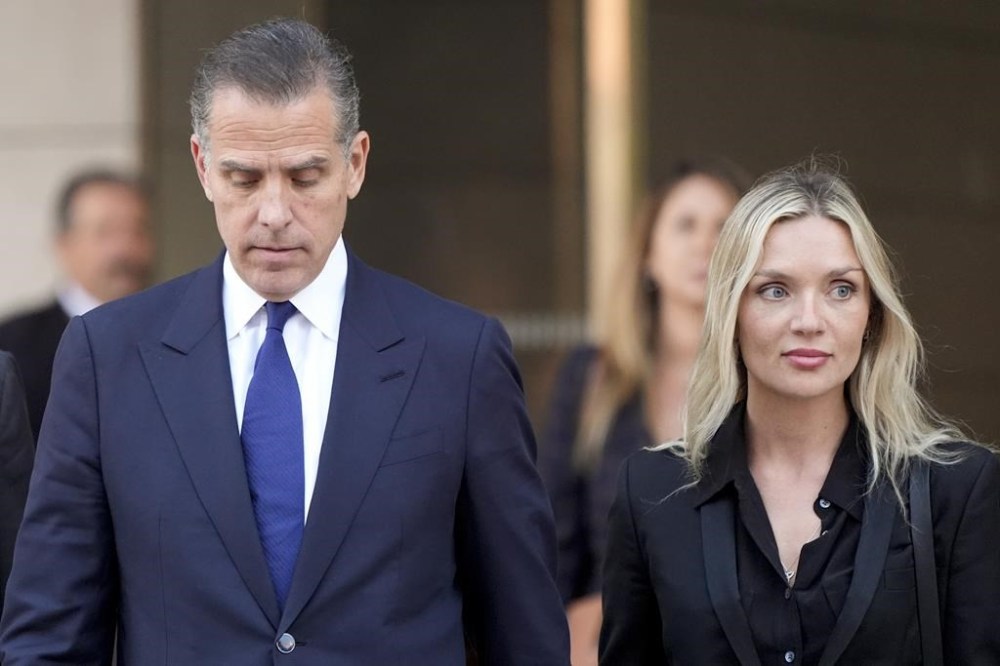 Hunter Biden leaves federal court with his wife Melissa Cohen Biden after pleading guilty in his felony federal tax case, Thursday, Sept. 5, 2024, in Los Angeles. (AP Photo/Jae C. Hong)