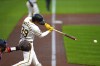 Pittsburgh Pirates' Nick Gonzales singles off Washington Nationals starting pitcher Jake Irvin, driving in two runs, during the second inning of a baseball game in Pittsburgh, Thursday, Sept. 5, 2024. (AP Photo/Gene J. Puskar)