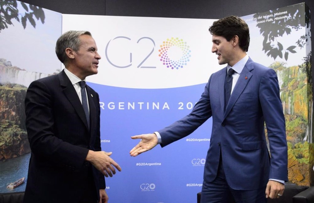 Prime Minister Justin Trudeau meets with then Bank of England governor Mark Carney at the G20 Summit in Buenos Aires, Argentina on Friday, Nov. 30, 2018. THE CANADIAN PRESS/Sean Kilpatrick